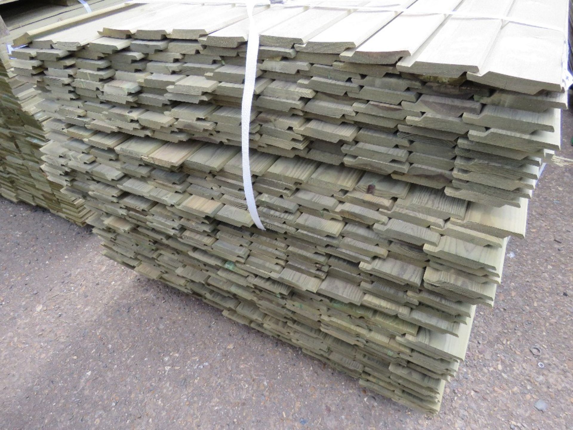 LARGE PACK OF SHIPLAP CLADDING TIMBER 1.83M X 9.5CM APPROX, PRESSURE TREATED. - Image 2 of 3
