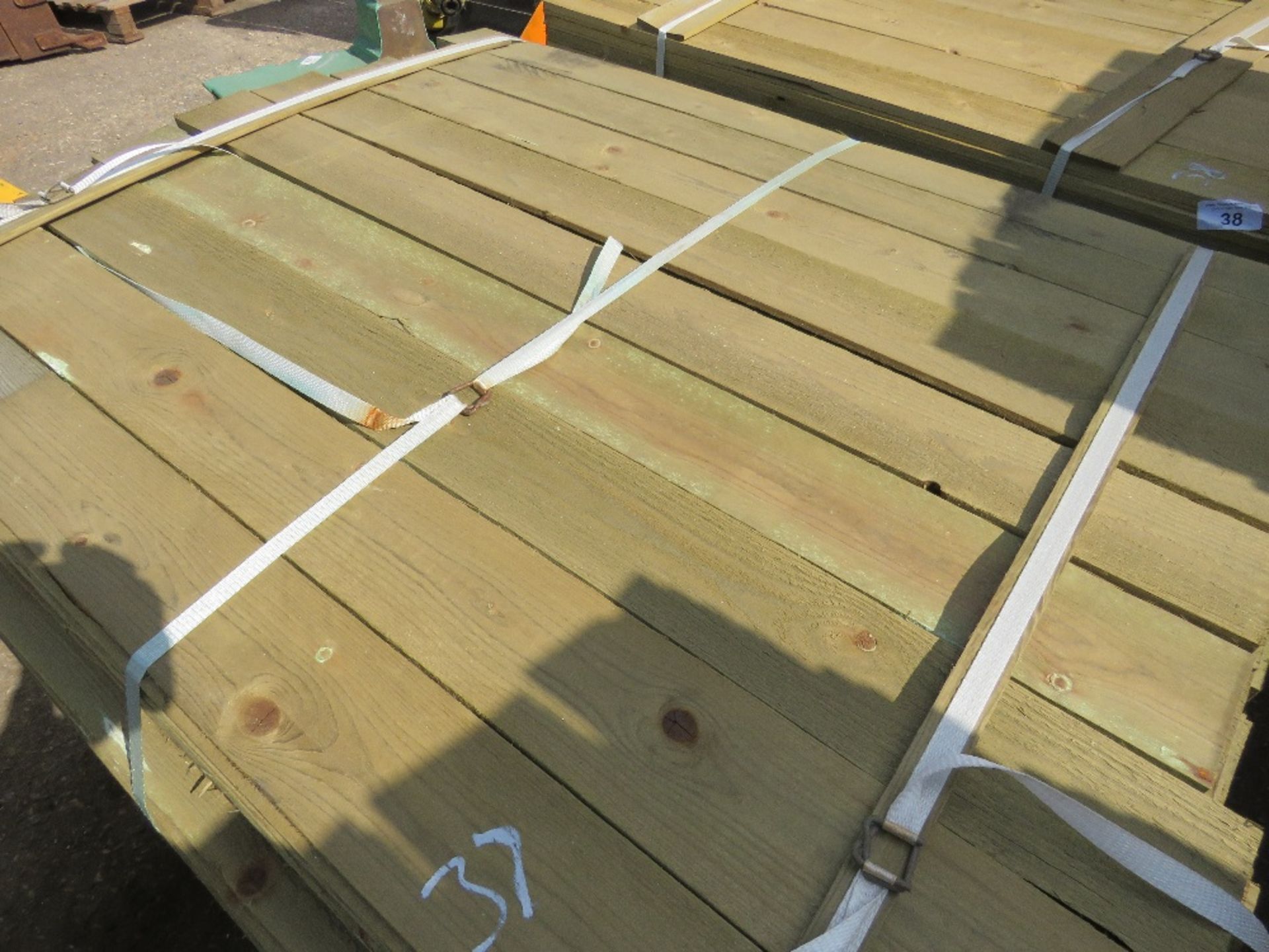 LARGE PACK OF FEATHER EDGE CLADDING TIMBER 1.2M X 10CM APPROX, PRESSURE TREATED. - Image 2 of 3