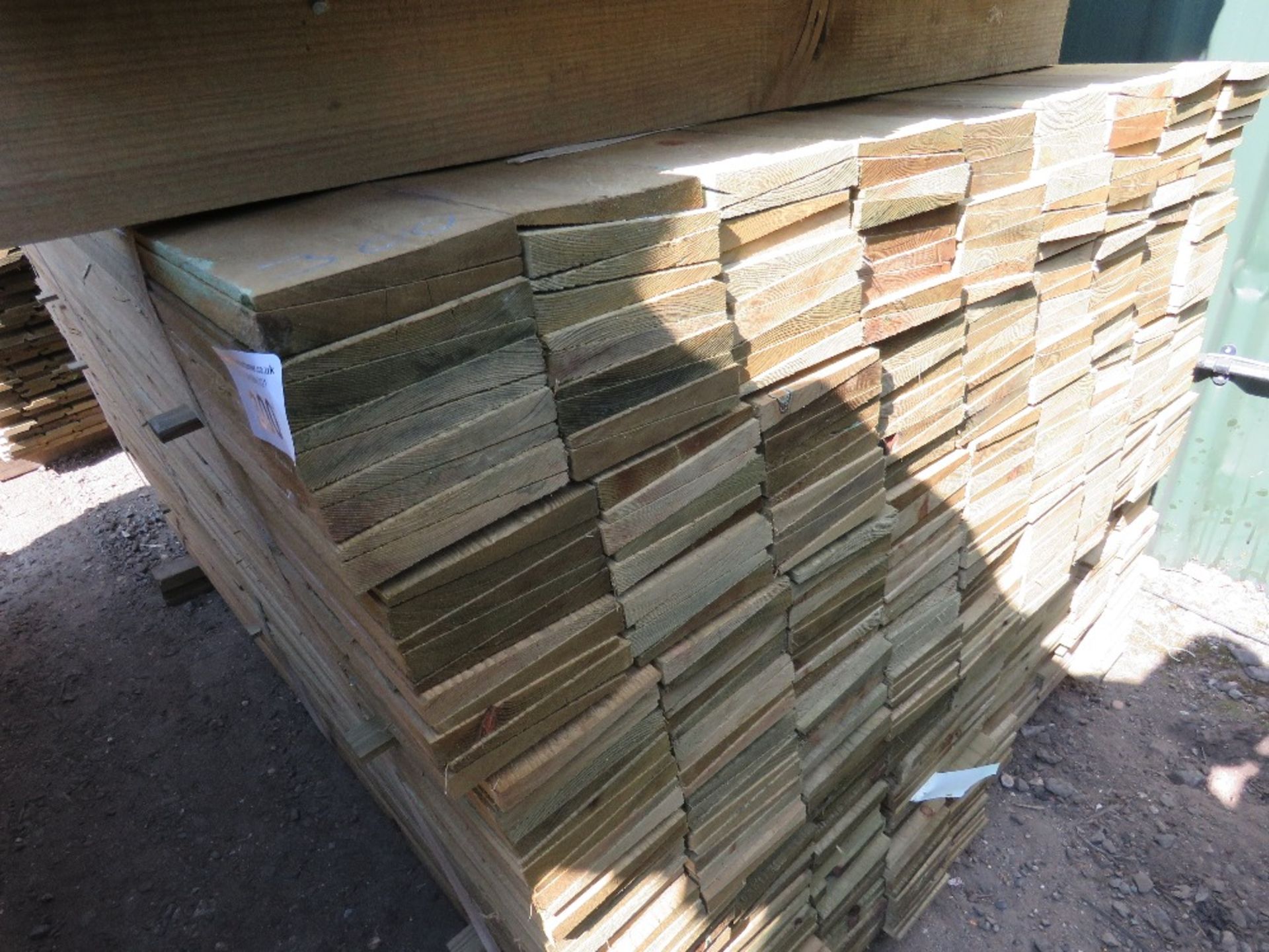 PACK OF PRESSURE TREATED FEATHER EDGE TIMBER FENCE CLADDING BOARDS, 1.50M LENGTH X 10.5CM WIDTH APPR