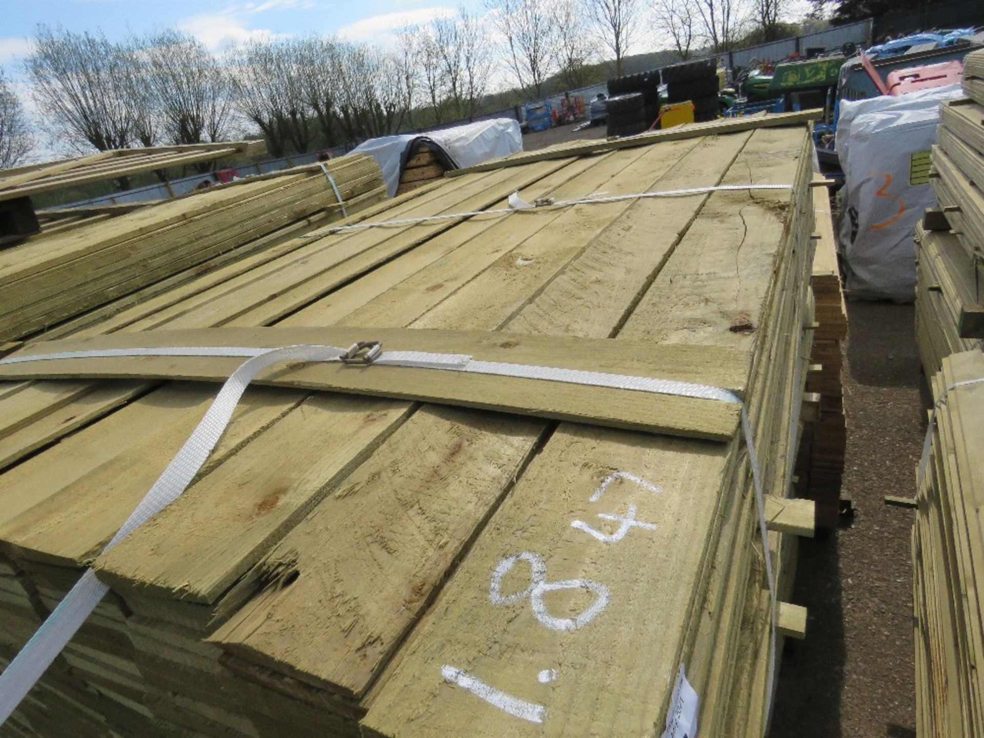 LARGE PACK OF FEATHER EDGE CLADDING TIMBER 1.8M X 10CM APPROX, PRESSURE TREATED. - Image 2 of 3