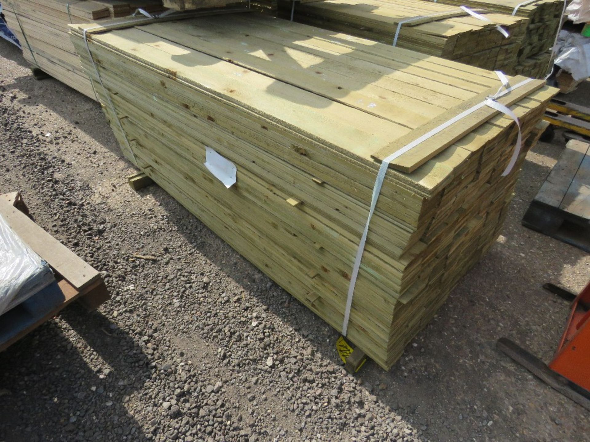 LARGE PACK OF FEATHER EDGE CLADDING TIMBER 1.8M X 10CM APPROX, PRESSURE TREATED. - Image 4 of 4