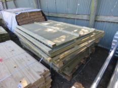 STACK OF ASSORTED FENCE PANELS.