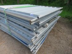 26 X SOILD TEMPORARY FENCE PANELS PLUS A WHEELED GATE AND A PALLET OF FEET, INCLUDES CLIPS