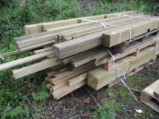 STACK OF FENCING TIMBER BOARDS AND POSTS ETC.