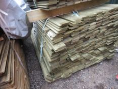 LARGE PACK OF SHIPLAP TIMBER CLADDING BOARDS, PRESSURE TREATED, 1.8M X 10CM APPROX.