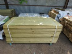 LARGE PACK OF TREATED & MACHINED HIT AND MISS FENCING BOARDS 1.74M X 95MM APPROX.