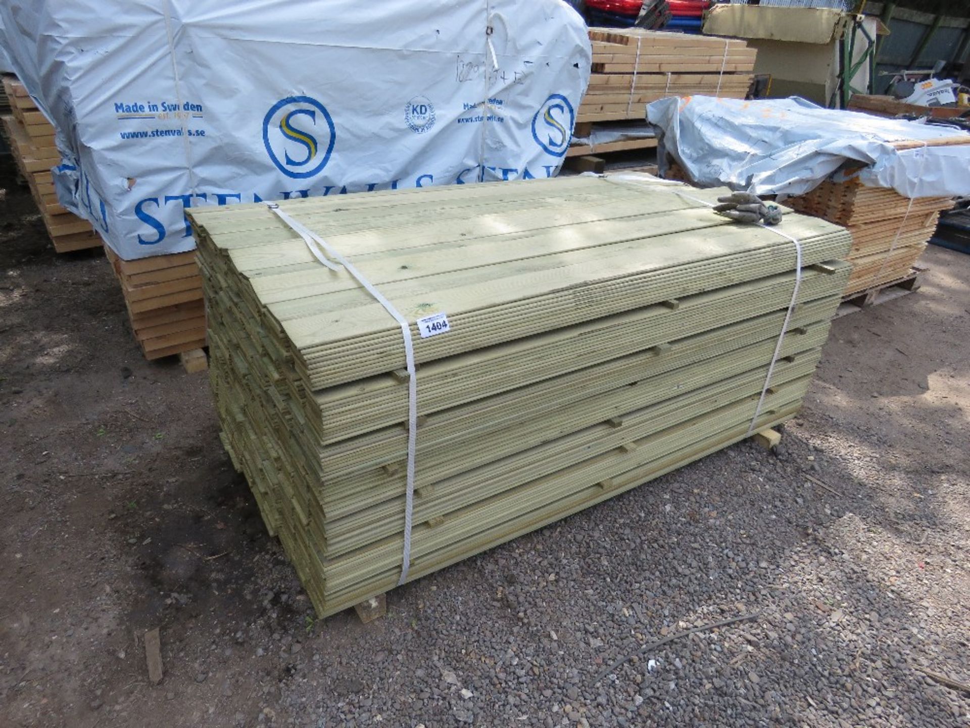 LARGE PACK OF TREATED MACHINED HIT AND MISS FENCE CLADDING BOARDS 1.74M X 95MM APPROX.