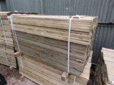 LARGE PACK OF FEATHER EDGE TIMBER CLADDING BOARDS, PRESSURE TREATED, 1.35M X 10.5CM APPROX.