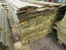 LARGE PACK OF PRESSURE TREATED FEATHER EDGE TIMBER CLADDING, 1.8M X 10CM APPROX.