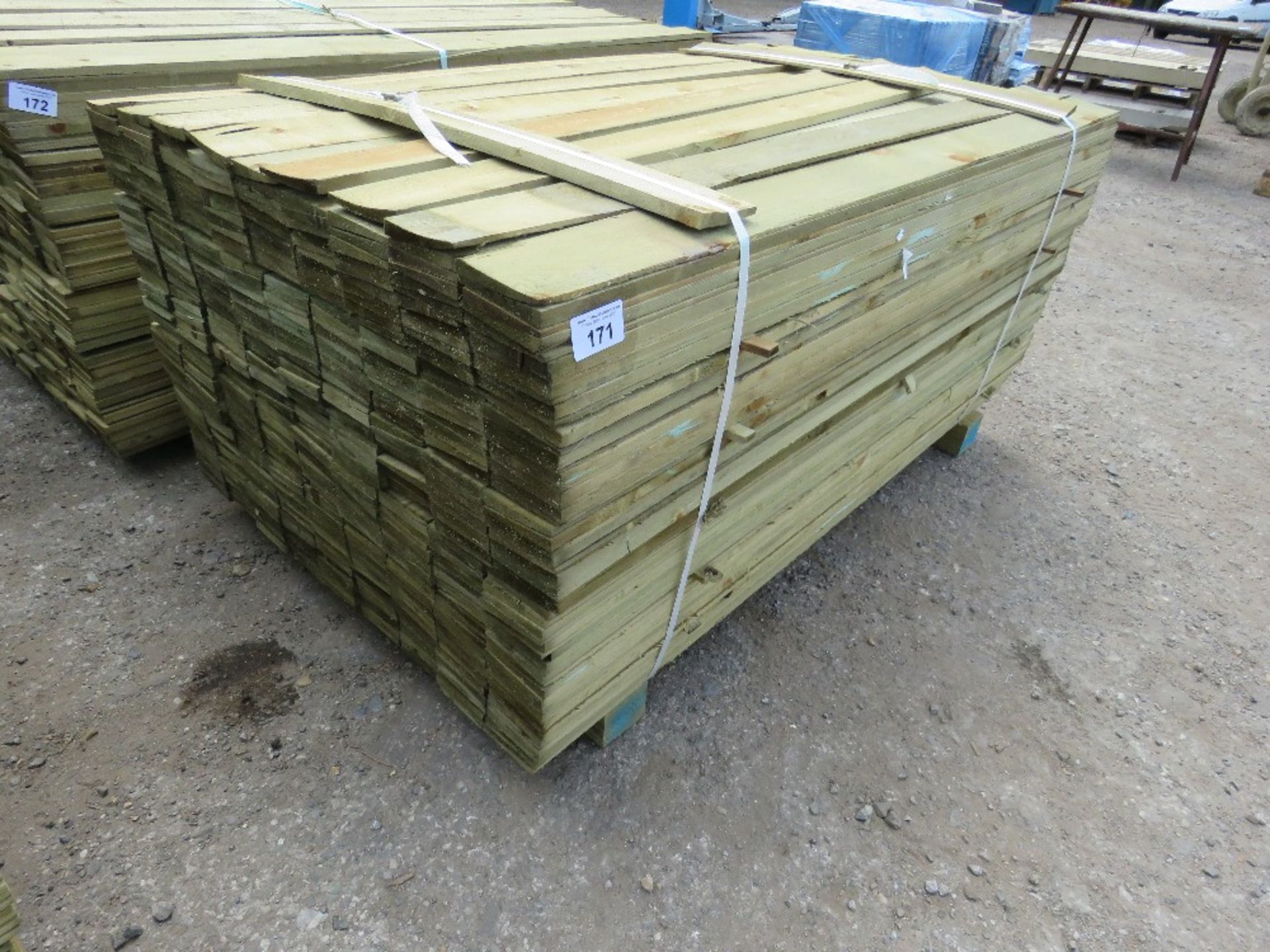 LARGE PACK OF TREATED FEATHER EDGE TIMBER CLADDING 1.65M X 10CM APPROX.