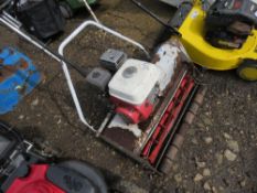 SILVER COLOURED CYLINDER MOWER.