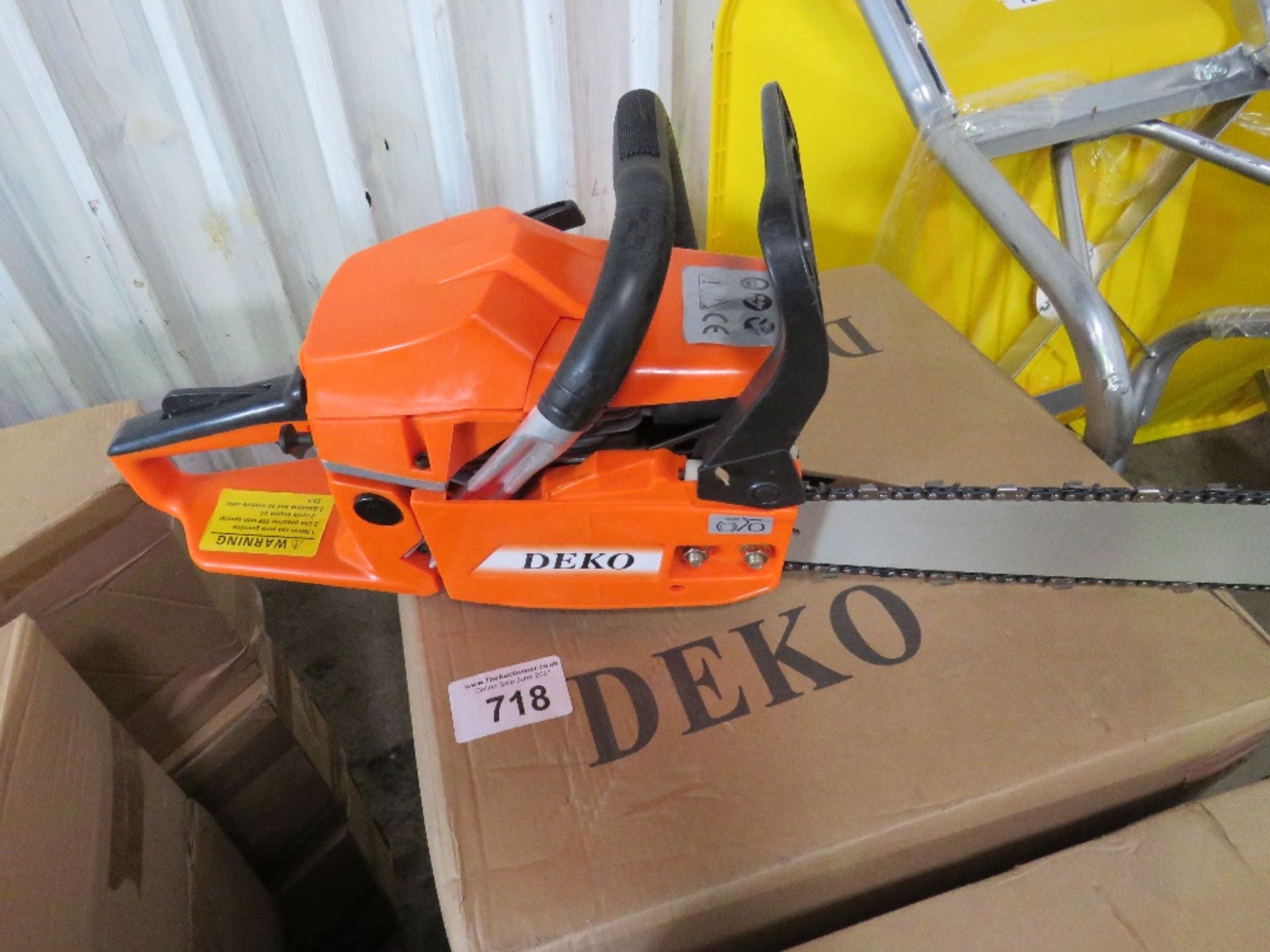 3 X DEKO PETROL ENGINED CHAINSAWS, IN BOXES, UNUSED. NO VAT ON HAMMER PRICE.