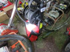 RED PRESSURE WASHER WITH LANCE AND HOSE, NO POWER LEAD.