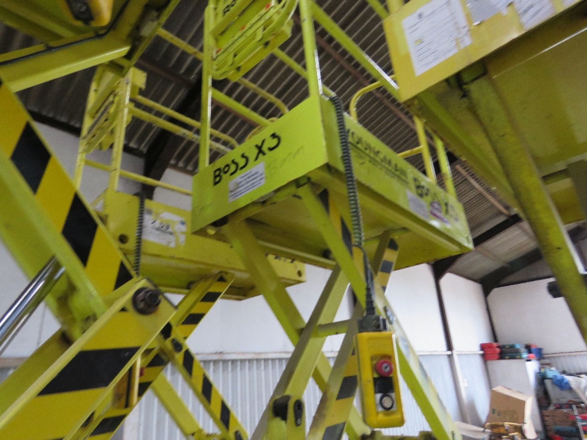 BOSS X3 SCISSOR LIFT ACCESS PLATFORM, YEAR 2013 BUILD. DIRECT FROM LOCAL COMPANY DUE TO A CHANGE IN