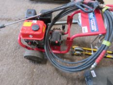 CLARKE PETROL ENGINED POWER WASHER WITH HOSE AND LANCE.