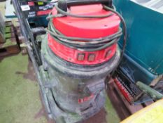 LARGE RED TOPPED INDUSTRIAL VACUUM.