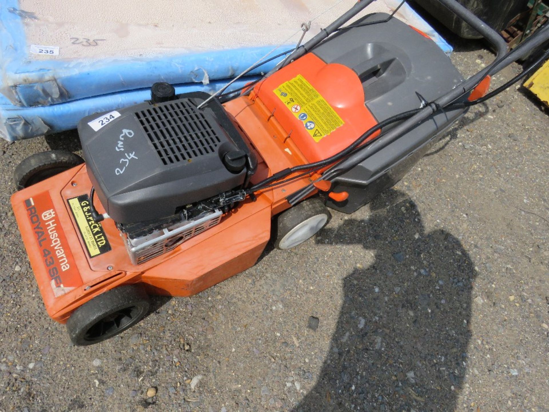 HUSQVARNA PETROL MOWER WITH A COLLECTOR.
