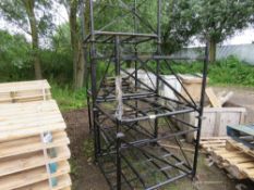 5 X BLACK PAINTED METAL STACKING STILLAGES.