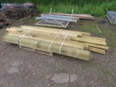 STACK OF ASSORTED TIMBER GATE POSTS AND FENCING TIMBERS.