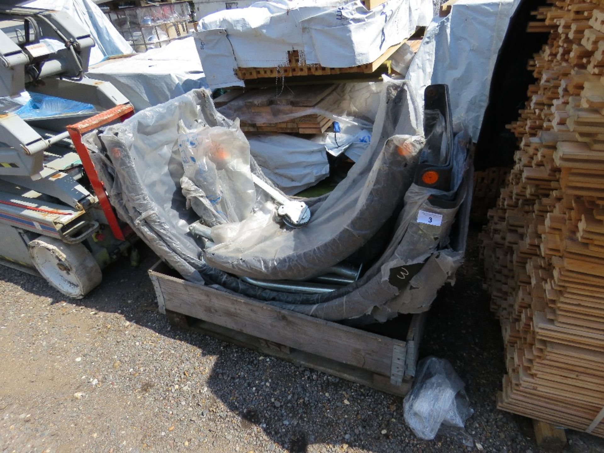 PALLET CONTAINING 9 X LORRY MUD WINGS PLUS SOME BRACKETS AND A CABLE BRAKE WINCH UNIT. ETC