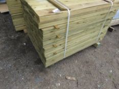 LARGE PACK OF FEATHER EDGE TREATED TIMBER, 1.20M X 10CM APPROX.