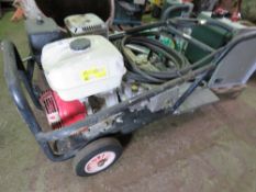 LARGE SIZED PETROL ENGINED PRESSURE WASHER WITH HOSE AND LANCE.