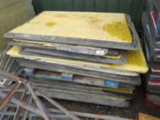 STACK OF ASSORTED PRE USED GRP CROSSING PLATES.