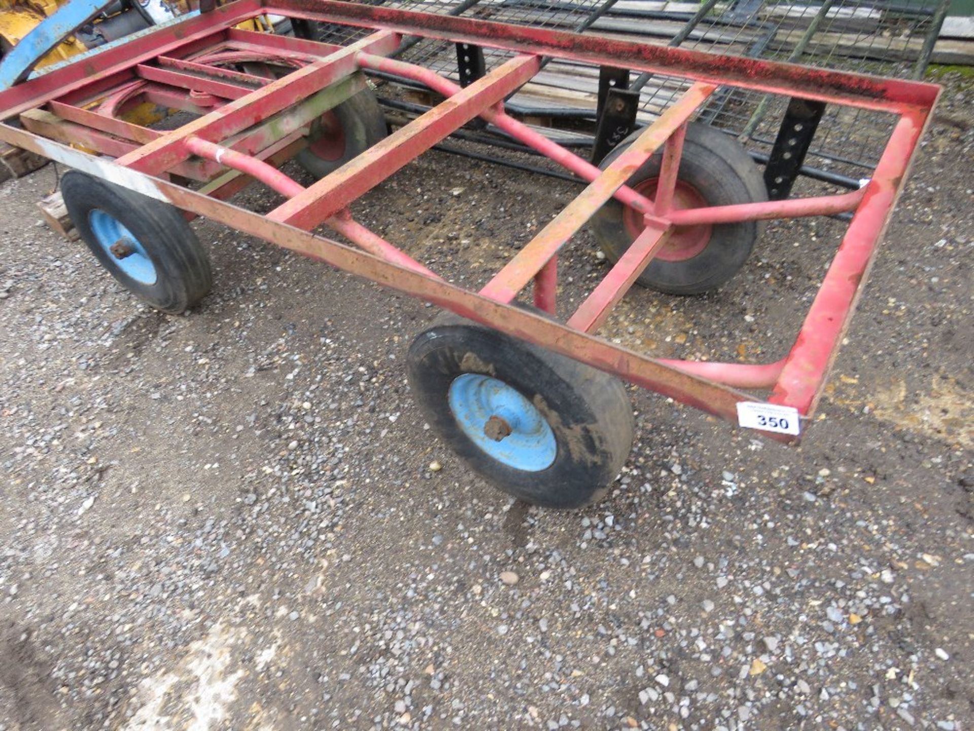 HEAVY DUTY 4 WHEEL TURNTABLE TROLLEY WITH TOW RING.