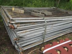 STACK OF APPROXIMATELY 32NO PRE USED HERAS TYPE MESH COVERED TEMPORARY SITE FENCE PANELS.