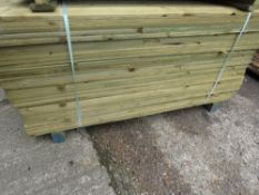 LARGE PACK OF TREATED FEATHER EDGE CLADDING TIMBER, 1.65M X 10.5CM APPROX.