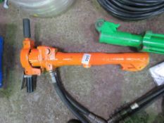 ORANGE HYDRAULIC BREAKER GUN.