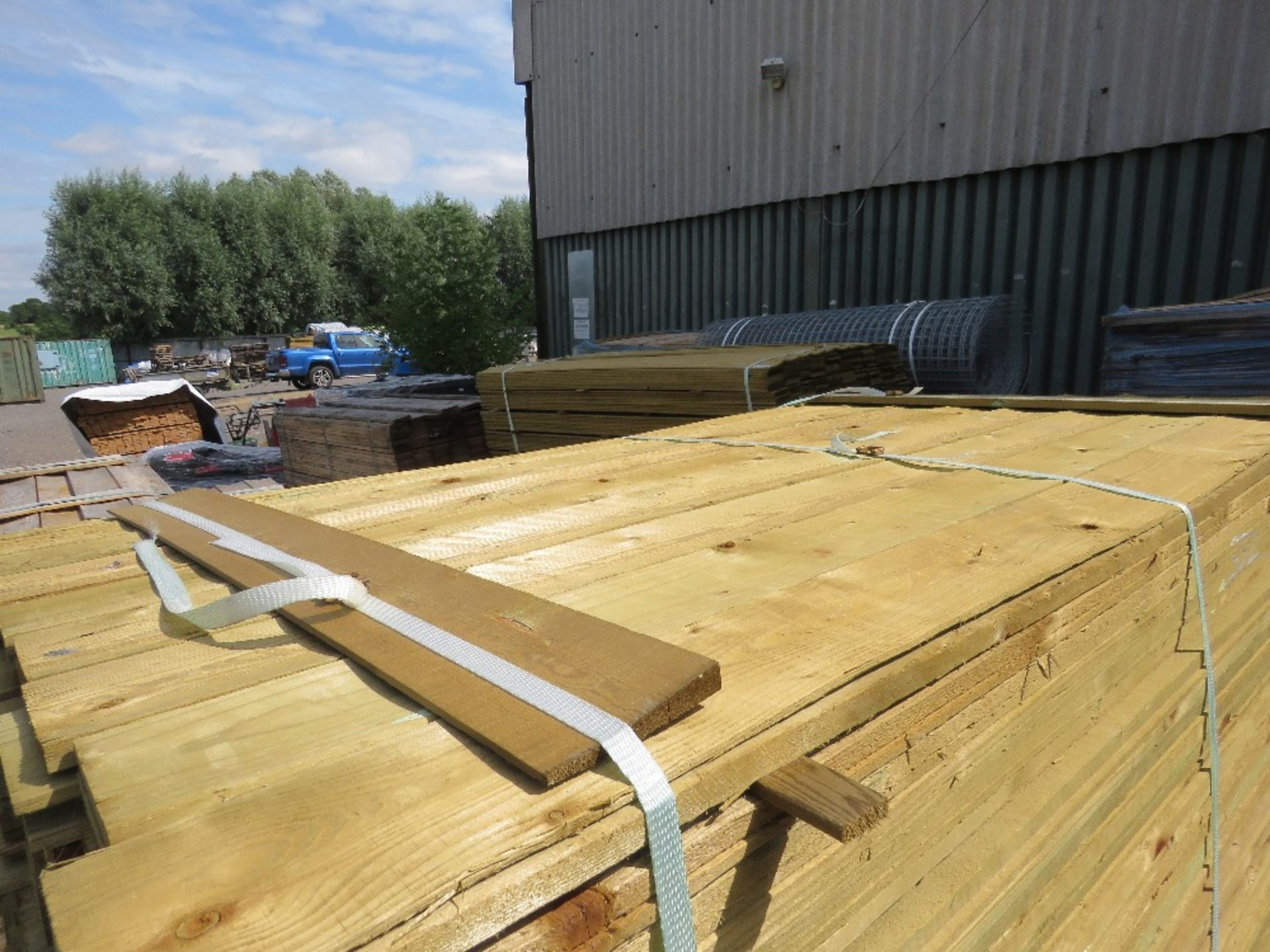 LARGE PACK OF TREATED FEATHER EDGE FENCE CLADDING TIMBER BOARDS, 1.64M LENGTH X 10CM WIDTH APPROX. - Image 2 of 3
