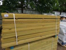 LARGE PACK OF TREATED HIT AND MISS TIMBER CLADDING. 1.74M LENGTH X 95MM WIDTH APPROX.