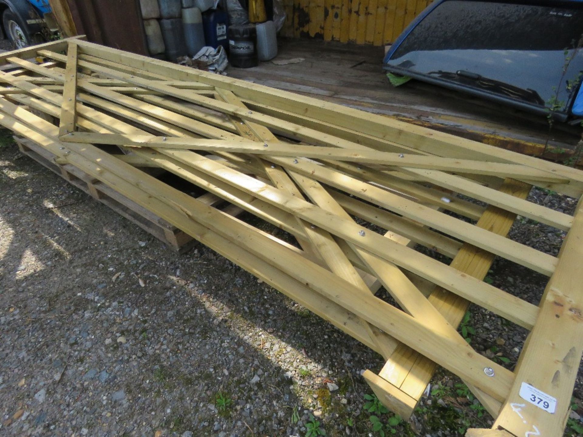 2 X WOODEN FIELD GATES @ 4.2M AND 3.6M WIDTH (SOME DAMAGE ON LOWER BAR OF 3.6M GATE).