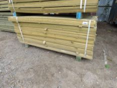 LARGE PACK OF TREATED HIT AND MISS TIMBER CLADDING. 1.74M LENGTH X 95MM WIDTH APPROX.