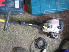 RYOBI PETROL ENGINED STRIMMER.