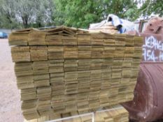 LARGE PACK OF TREATED HIT AND MISS TIMBER CLADDING. 1.74M LENGTH X 95MM WIDTH APPROX.