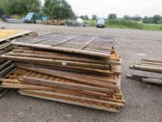 2 X STACKS OF ASSORTED WOODEN TRELLIS AND FENCE PANELS, SHOP SOILED.
