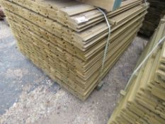 LARGE PACK OF PRESSURE TREATED SHIPLAP FENCING TIMBER. 1.54M LENGTH X 9.5CM WIDTH APPROX.