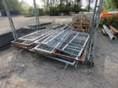 LARGE STILLAGE OF ASSORTED METAL GATES / GATE FRAMES. 13NO APPROX IN TOTAL. INCLUDES STILLAGE.