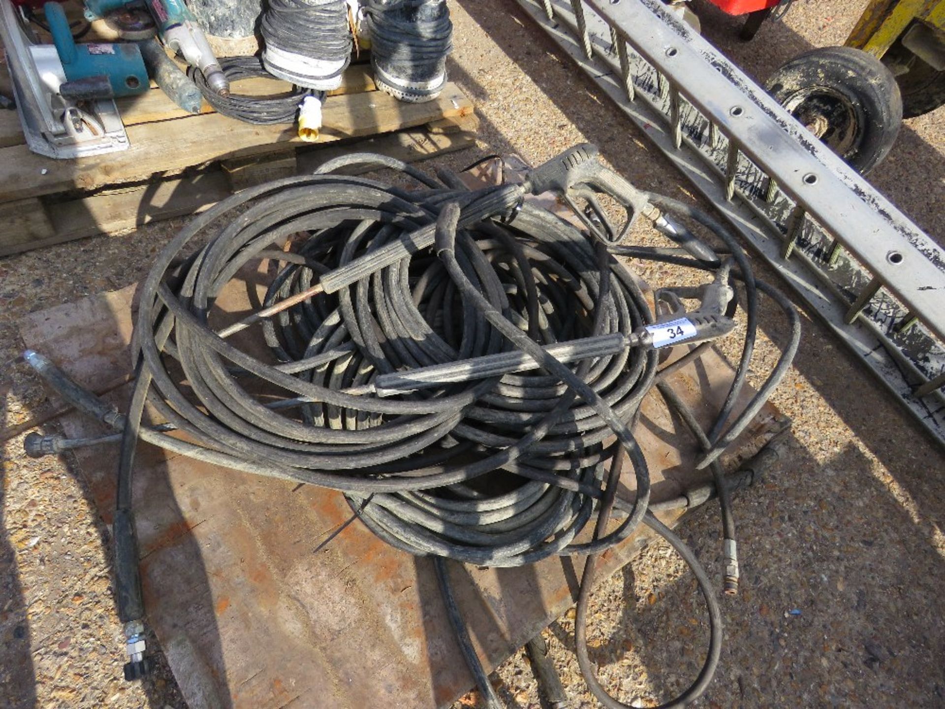 PALLET CONTAINING PRESSURE WASHER HOSES, INCLUDING 2 X LANCES.