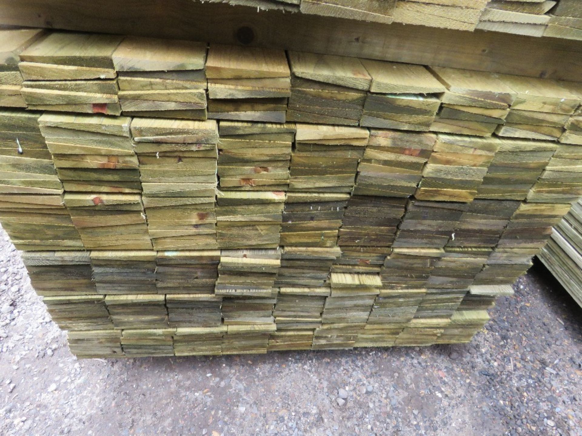 LARGE PACK OF TREATED FEATHER EDGE TIMBER CLADDING BOARDS, 1.2M LENGTH X 10CM WIDTH APPROX. - Image 3 of 5