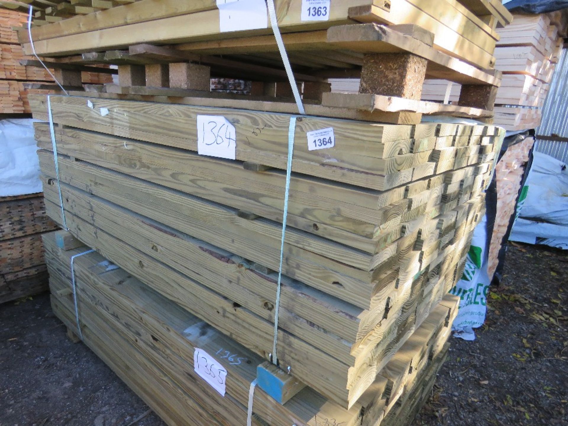 LARGE PACK OF 140NO TIMBER BOARDS, PRESSURE TREATED. SIZE: 1.83M LENGTH X 140MM WIDE X 30MM DEPTH AP