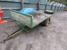SINGLE AXLED 13FT APPROX FLAT BED AGRICULTURAL TRAILER. ONE TYRE U/S BUT HAS A SPARE WHEEL INCLUDED.