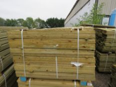 LARGE PACK OF TREATED FEATHER EDGE TIMBER CLADDING BOARDS, 1.2M LENGTH X 10CM WIDTH APPROX.