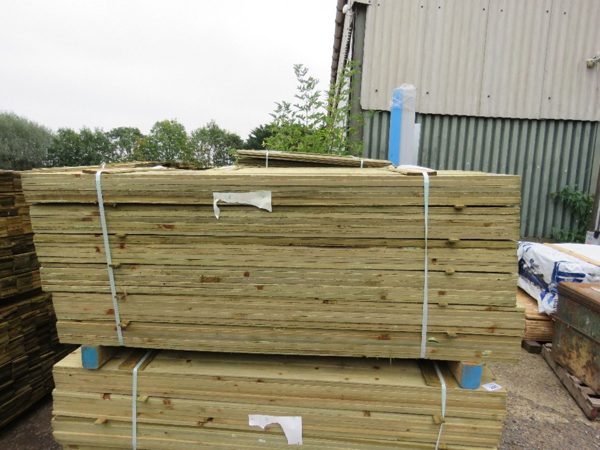 LARGE PACK OF TREATED FEATHER EDGE TIMBER CLADDING BOARDS, 1.80M LENGTH APPROX X 10CM WIDTH APPROX. - Image 4 of 4