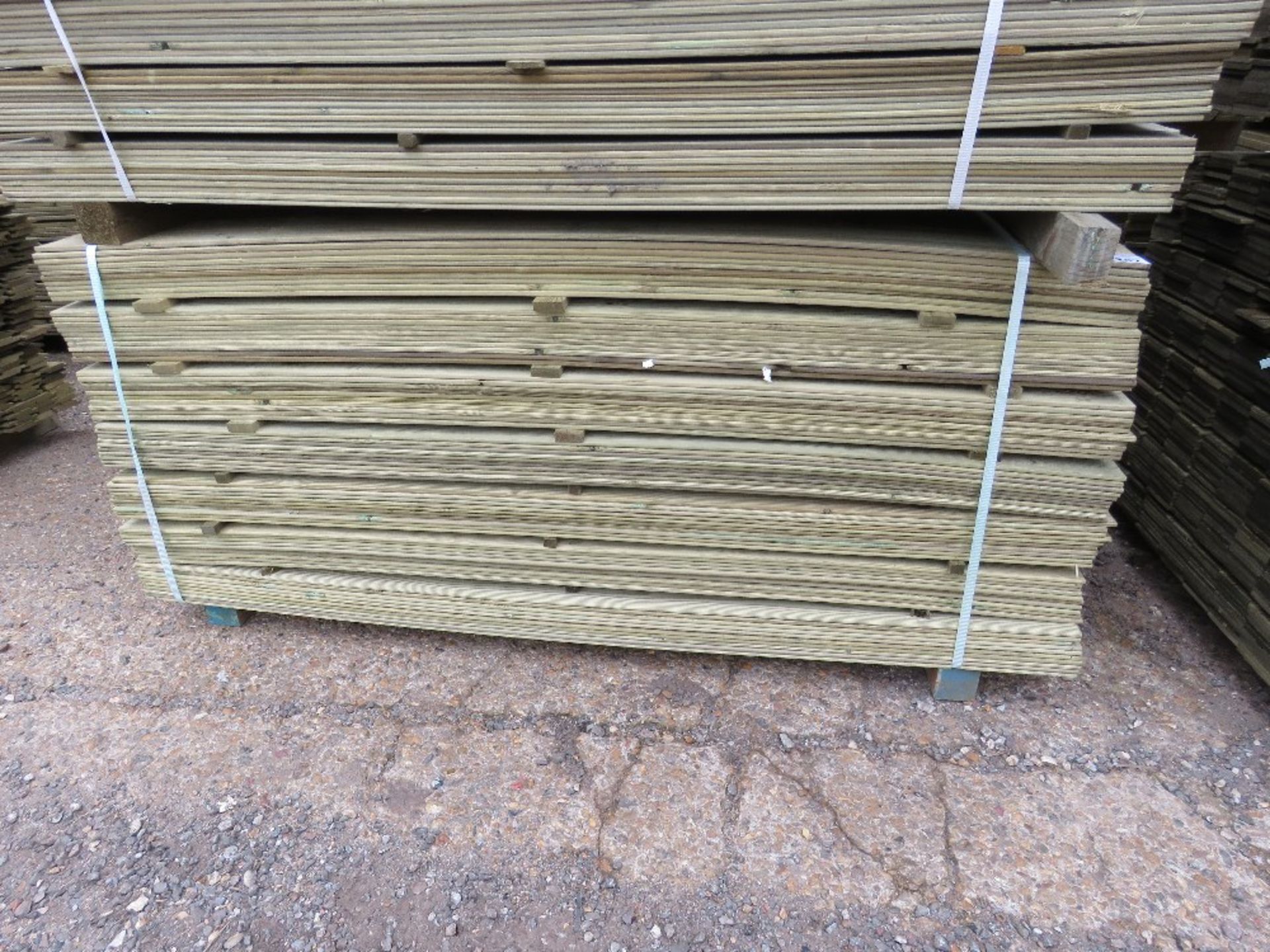 LARGE PACK OF TREATED HIT AND MISS THIN TIMBER CLADDING BOARDS, 1.75M LENGTH X 9.5CM WIDTH APPROX.