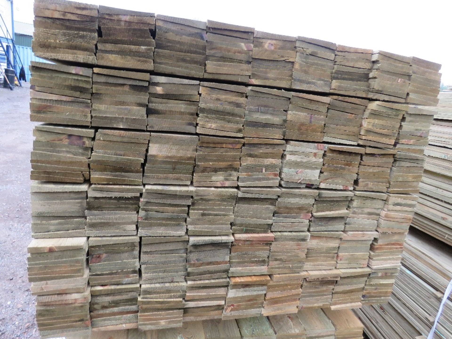 LARGE PACK OF TREATED FEATHER EDGE TIMBER CLADDING BOARDS, 1.80M LENGTH APPROX X 10CM WIDTH APPROX. - Image 2 of 4