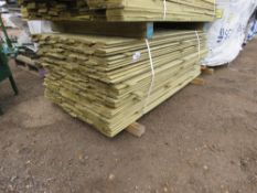 LARGE PACK OF TREATED SHIPLAP TIMBER FENCE CLADDING BOARDS. SIZE: 1.73M LENGTH X 100MM WIDTH APPRO