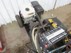 HEAVY DUTY PETROL ENGINED PRESSURE WASHER WITH HOSE AND LANCE. WHENTESTED WAS SEEN TO START AND RUN.